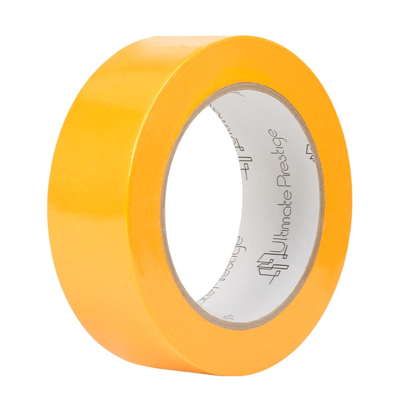 Roll of yellow tape with 'Ultimate Prestige' branding on a white background